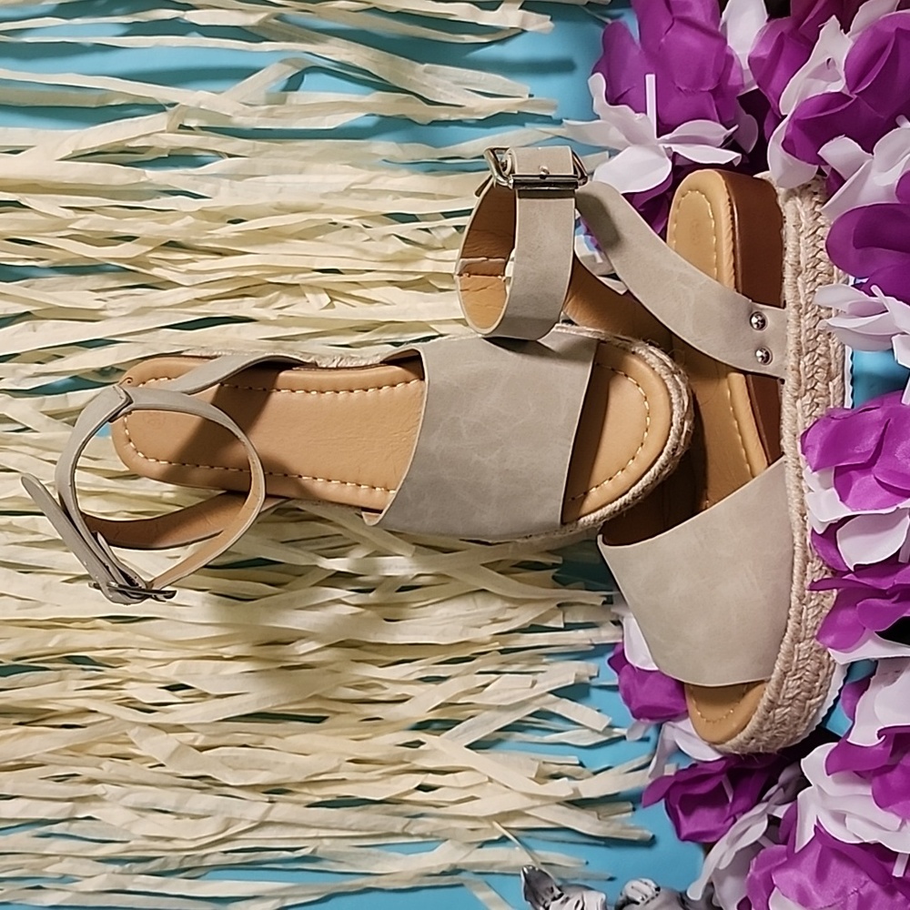 NWOT light Tanish gray ankle wrap wedges with silver hardware.